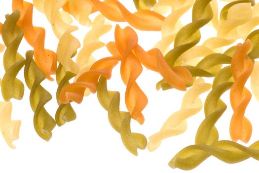 Isolated macro image of vegeroni spirals pasta.