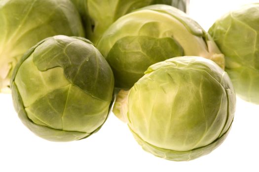 Isolated macro image of Brussel Sprouts.