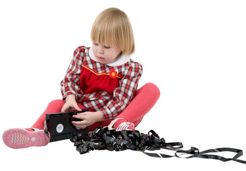 Girl with video cassette on a white background