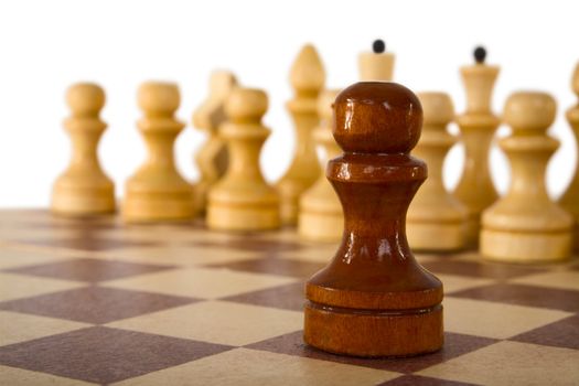 Foreground chess pawn  on a white background