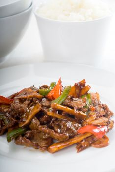 typical chinese dish,fresh beef stir fried with pepperrs bamboo sprout and mushrooms