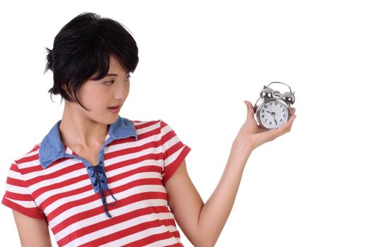 Woman with alarm clock, closeup portrait on white background.