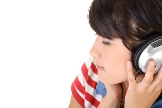 Listen music, closeup portrait of Asian woman with headphones with copyspace on white.