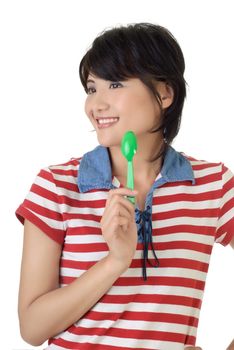 Happy time of eat, closeup portrait of woman holding tablespoon and smiling.