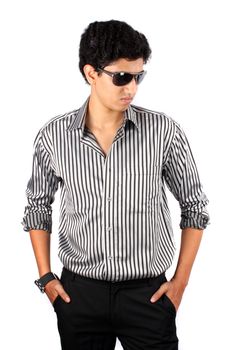 A portrait of a smart Indian guy wearing sunglasses, on white studio background.