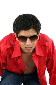 A portrait of a stylish Indian teenage model wearing sunglasses.