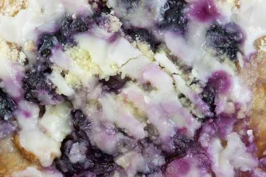sweet background - macro shot of fresh blueberry Danish pastry