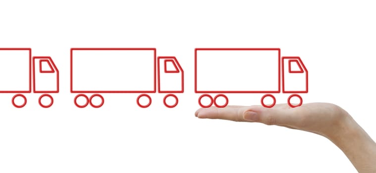 A human hands with concept red trucks