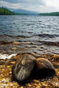 Rocks on the coast of Oswegetchie lake.