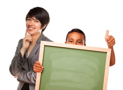 Hispanic Boy Holding Chalk Board with Thumbs Up and Female Teacher Behind Isolated on a White Background.