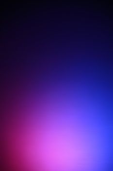Multicolor background of blue,pink,and red with vignette