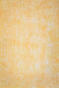 Dark yellow grunge background texture in varating hues