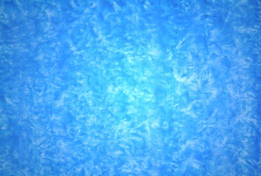 Blue mottled grunge background in variating hues