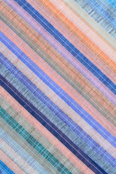 Background made from nice striped multi colored cotton fabric