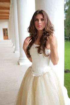 beautiful girl in white-golden luxurious gown