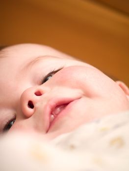 Cute young  baby boy smiling  happily