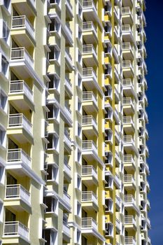 Image of many balconies of an apartment building in Malaysia.