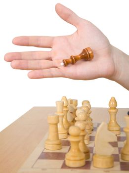 Hand and chess-man on a white background