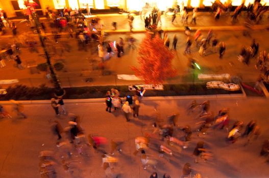 Crowd moving in the plaza shopping district, Kansas City.