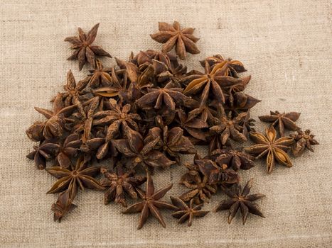 Aromatic anise on linen background