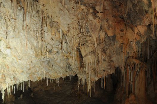 Image of the inside of a cave , details with stalactites .Israel .