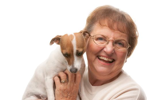 Happy Attractive Senior Woman with Puppy Isolated on a White Background.