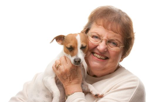 Happy Attractive Senior Woman with Puppy Isolated on a White Background.