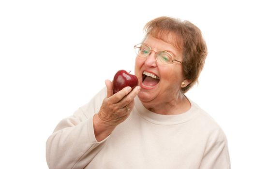 Attractive Senior Woman with Apple Isolated on a White Background.