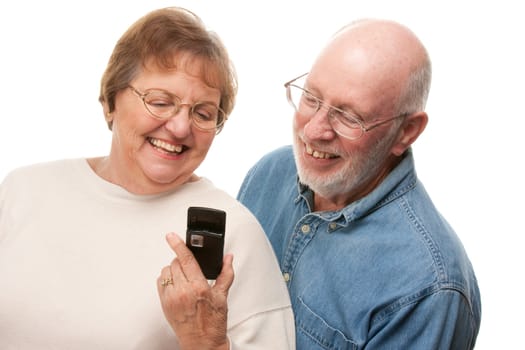 Happy Senior Couple Using Cell Phone Isolated on a White Background.