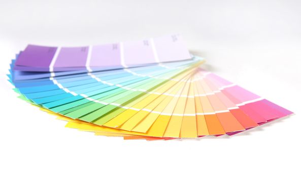 Bright Colorful Paint Swatch Samples for Remodeling a Home or Office on White Background. Shallow Depth of Field.