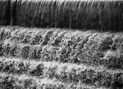 Water flowing down a terraced wall in Chadwick Lakes in Malta