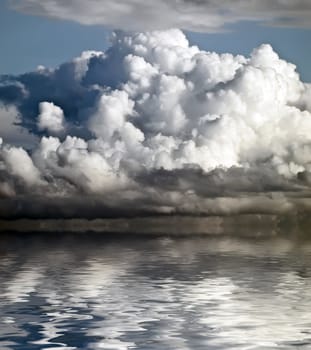 Large nimbus cloud looming over horizon