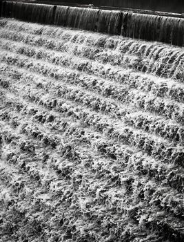 Water flowing down a terraced wall in Chadwick Lakes in Malta