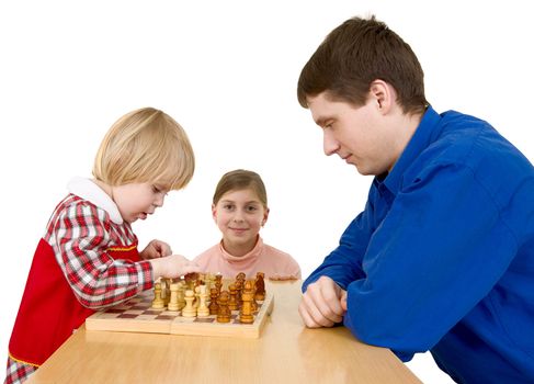 Man and childs play chess on a white background
