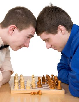 Men play chess and looking each other 