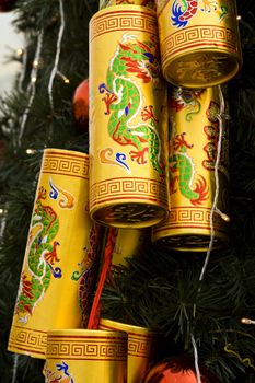Chinese New Year tree decorated with special cans with dragon symbols
