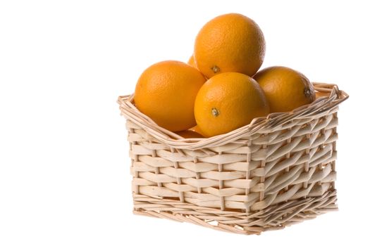 Isolated image of oranges in a basket.