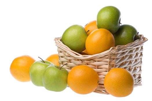 Isolated image of apples and oranges in a basket.
