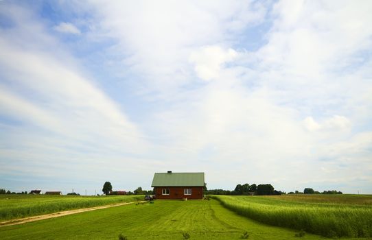 country house in the middle of fields