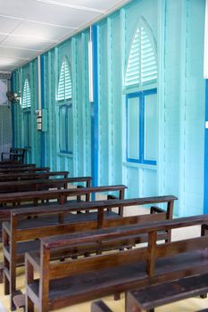 Image of an old wooden village chapel in Malaysia.