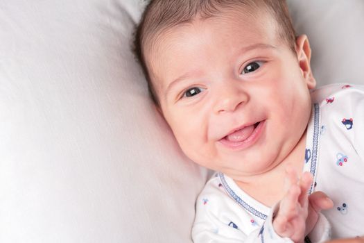 portrait of the smiling lucky baby-boy