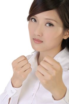 Fighting pose of businesswoman, closeup portrait of oriental office lady on white background.