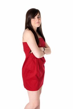 Young beautiful girl with red dress standing isolated on white background.