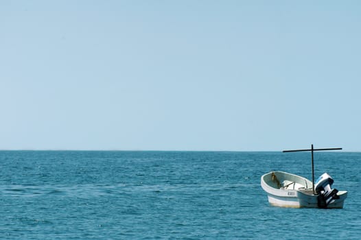 Single boat on the morning sea, Puerto Escondido, Mexico