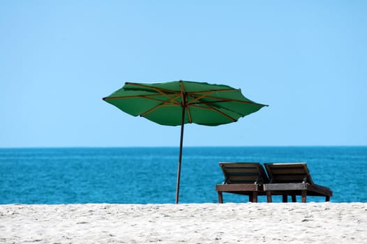 Beach umbrellas and deck chairs, Puerto Escondido, Mexico