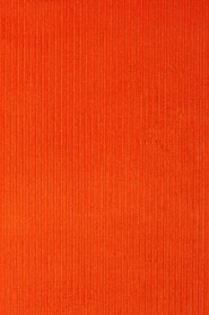 red corduroy textile background from a vintage book cover