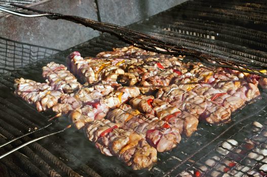 Meat pork on a italian festival barbecue grill