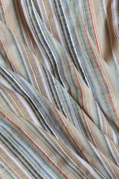 Background made from nice striped multicolored cotton fabric