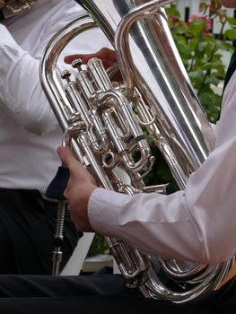 Hands on tuba keys