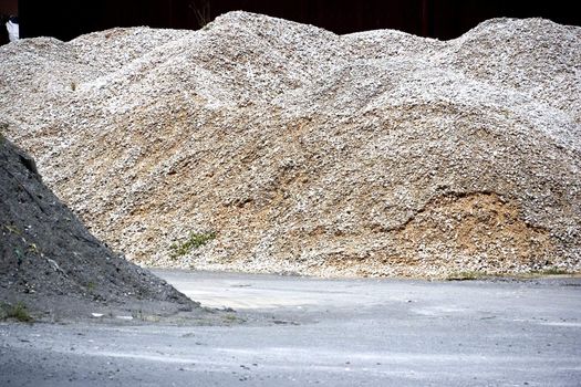 Image of a granite stone aggregate meant for road construction at a rock quarry in Malaysia.